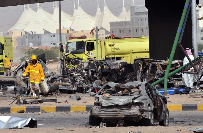 Saudi rescue workers are seen at the site where a truck transporting gas exploded on November 1, 2012 in Riyadh. 