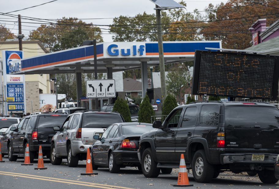 Cars wait in line for fuel at a Gulf gas station in Fort Lee, New Jersey.