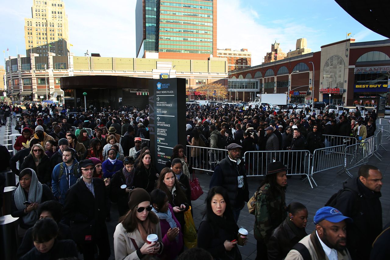 Thousands of people wait to board city buses into Manhattan, and some subway lines remain underwater. Getting water out of the tunnels is "one of the main orders of business right now," Gov. Andrew Cuomo said Thursday.