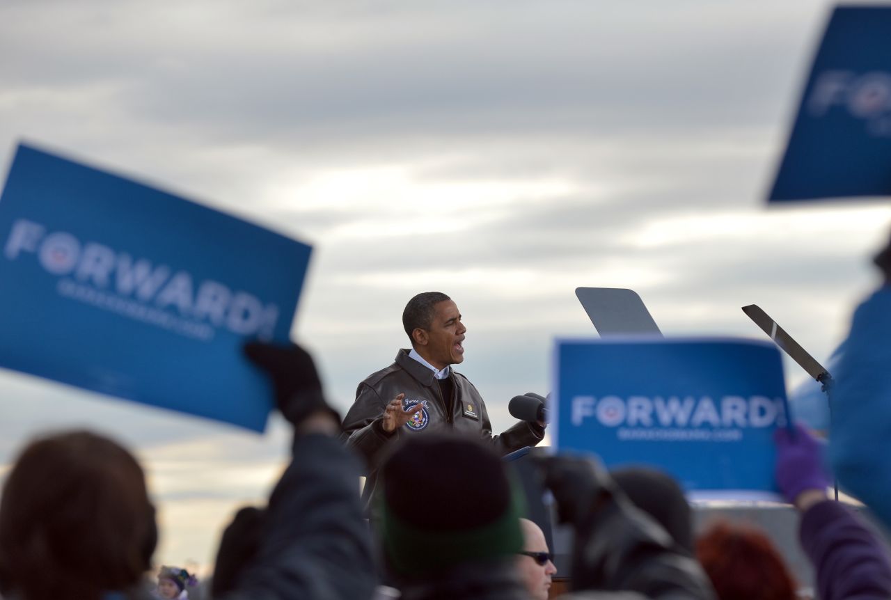 Obama addresses a campaign rally Thursday at  Austin Straubel International Airport in Green Bay, Wisconsin.