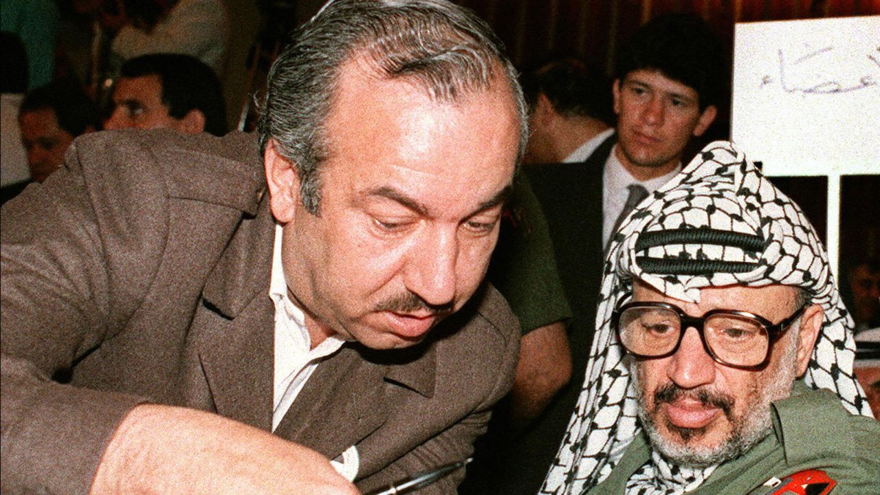 A picture taken on April 22, 1987 shows late Palestinian leader Yasser Arafat, consulting with Fatah military chief Khalil al-Wazir.