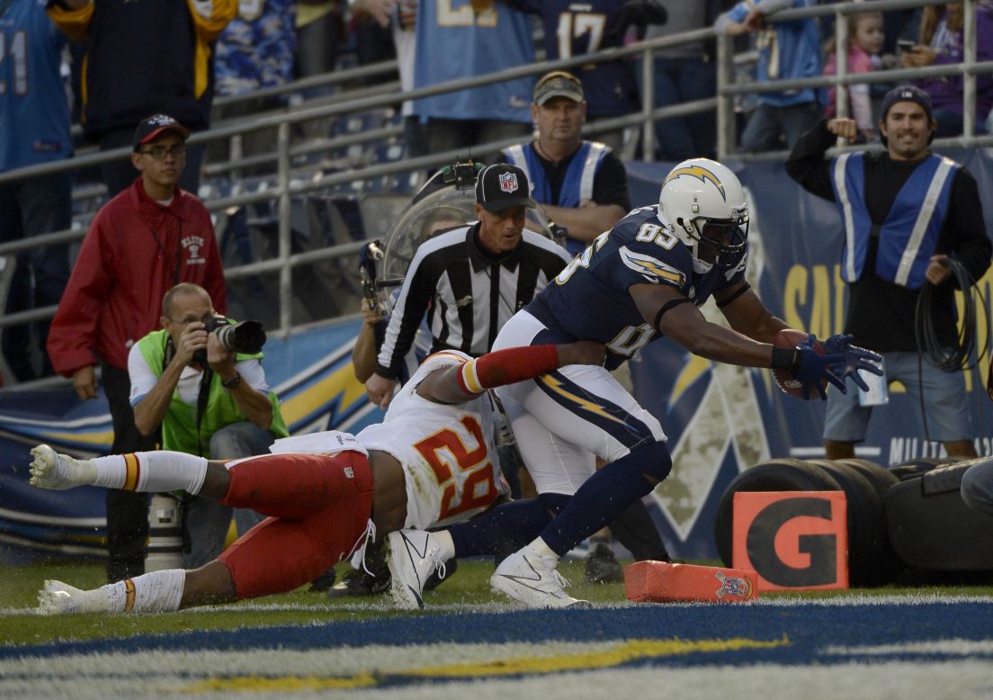 Antonio Gates of the San Diego Chargers scores a touchdown against Eric Berry of the Kansas City Chiefs on Thursday, November 1, at Qualcomm Stadium in San Diego. 