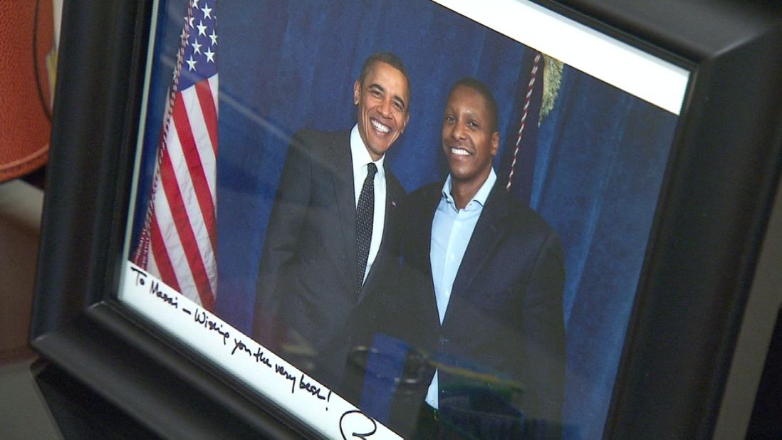 Ujiri poses alongside President Barack Obama, himself a keen basketball fan.