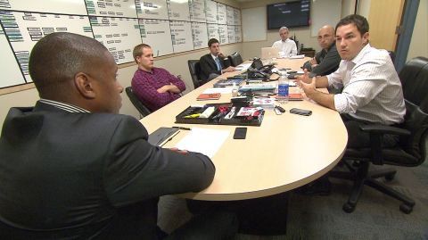 Ujiri meets with his backroom team. Ujiri has had a nomadic career which has seen him play, coach and scout across three continents.