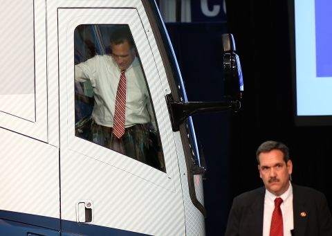 Romney gets ready to step off his campaign bus during an event Thursday, November 1, in Doswell, Virginia.