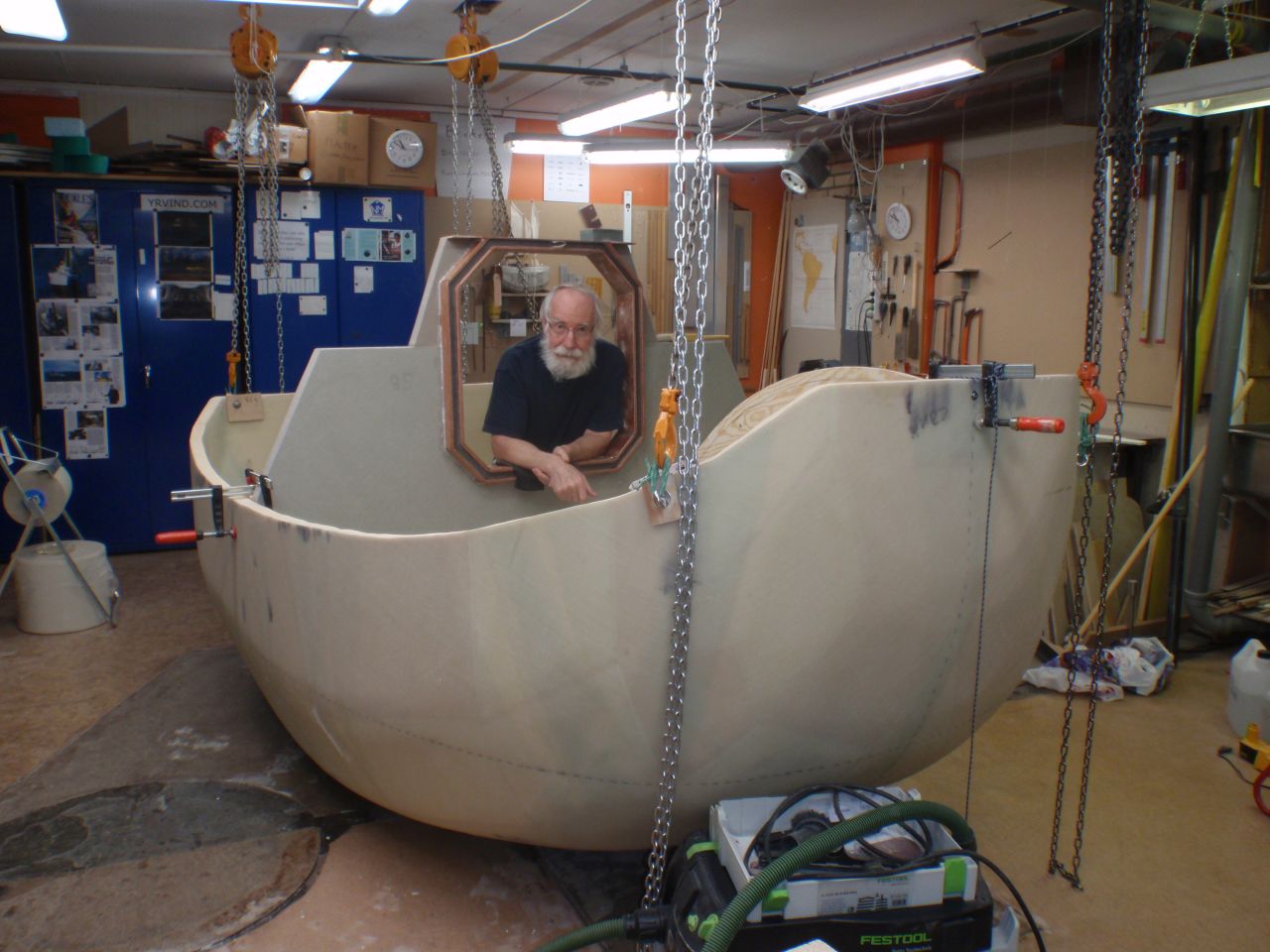 Sven Yrvind with his half-constructed vessel, Yrvind Ten. The 73-year-old plans to sail the three meter boat around the world.