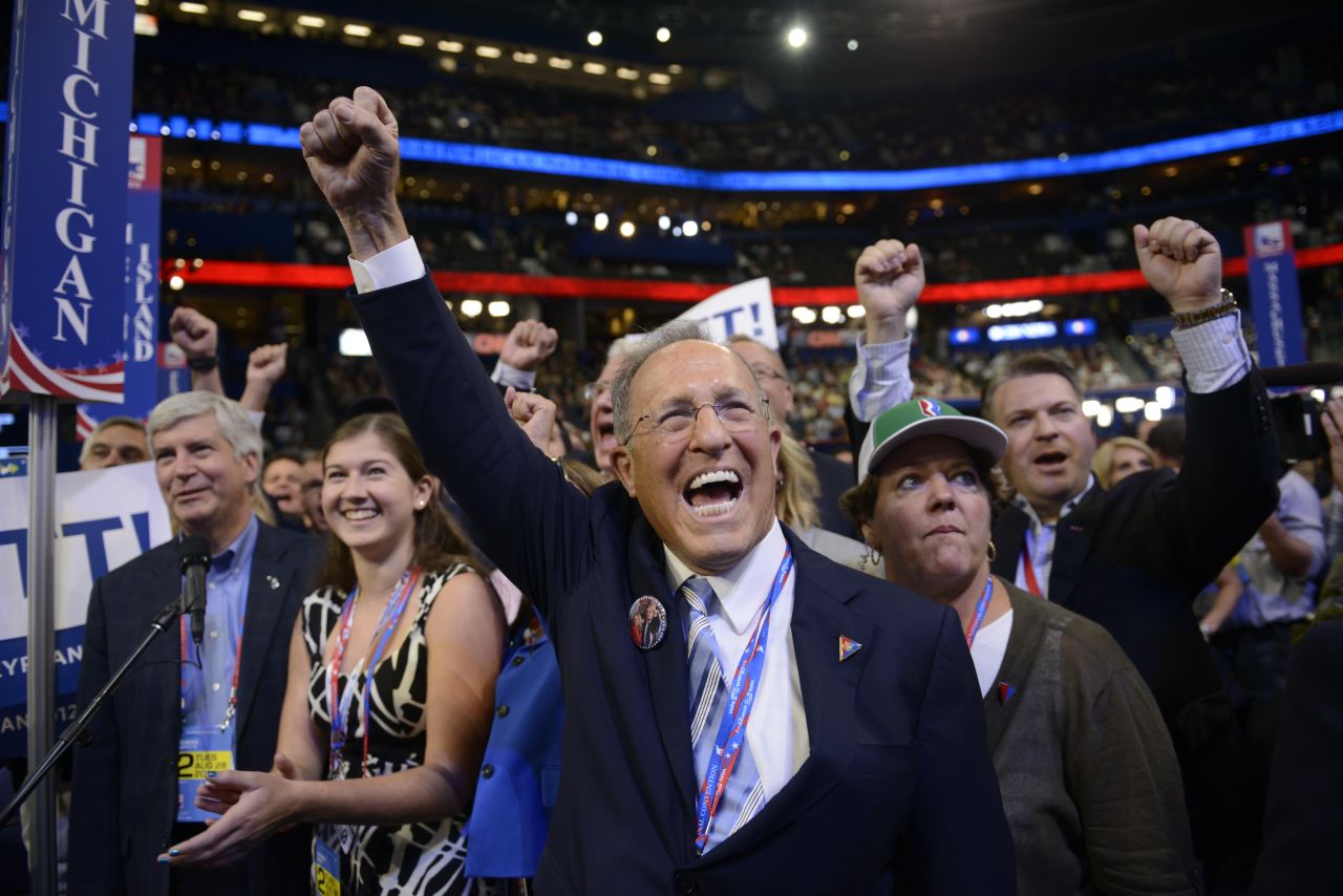 Mitt Romney's brother Scott cheers during the roll call for nomination of the Republican presidential candidate at the 2012 Republican National Convention.
