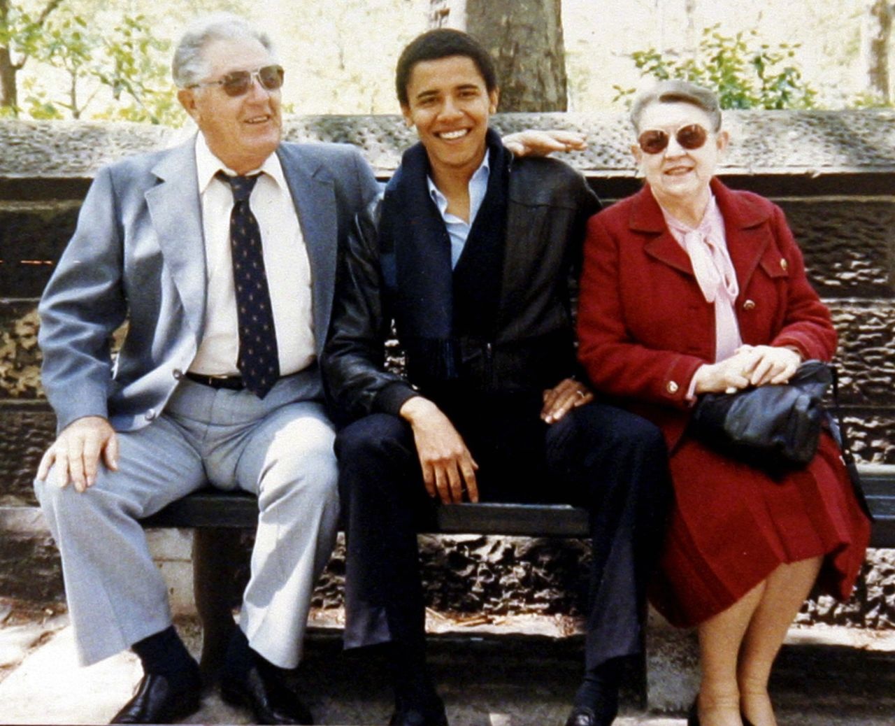 President Obama  with his maternal grandparents, Stanley and Madelyn Dunham, in an undated family snapshot.