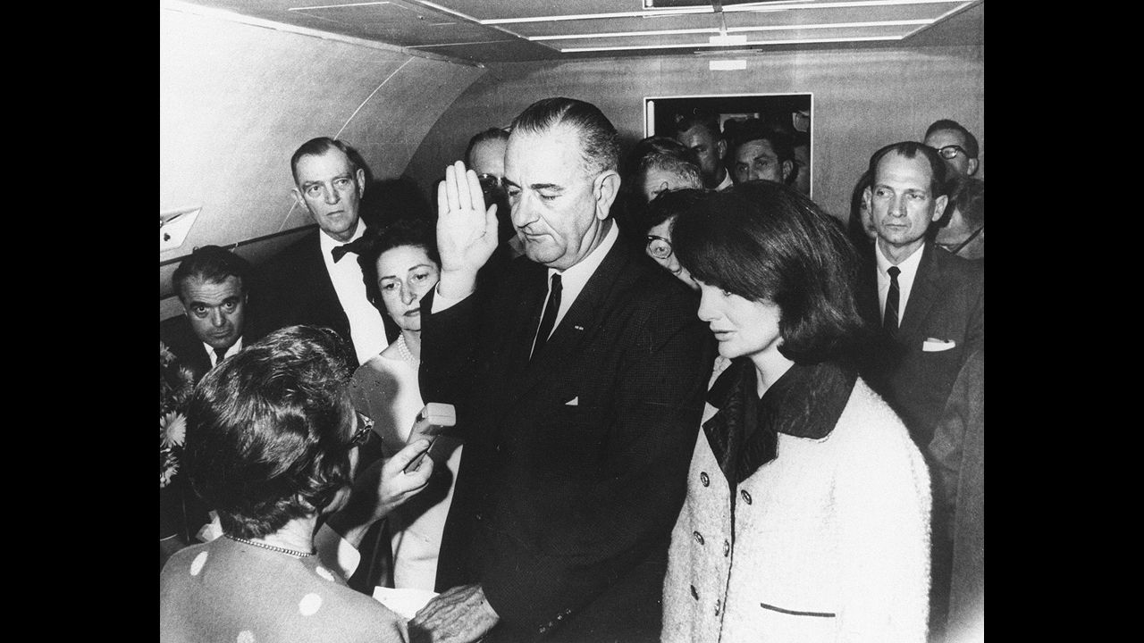 Lyndon B. Johnson (1963-1969) was vice president under John F. Kennedy and took the oath of office on a plane after Kennedy was assassinated. In 1964, Johnson signed the Civil Rights Act, the landmark legislation that banned segregation and discrimination based on race and gender. The law was a cornerstone of Johnson's vision of a "Great Society" that also included a "war on poverty."