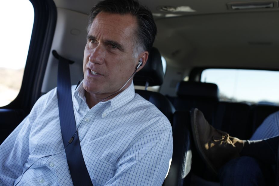Romney is briefed on Hurricane Sandy during phone call inside his vehicle in Des Moines, Iowa, Oct. 29, 2012. 
