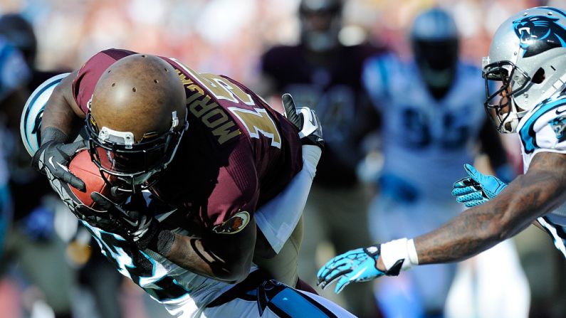 Josh Morgan of the Redskins makes a catch for a first down against the Panthers on Sunday.