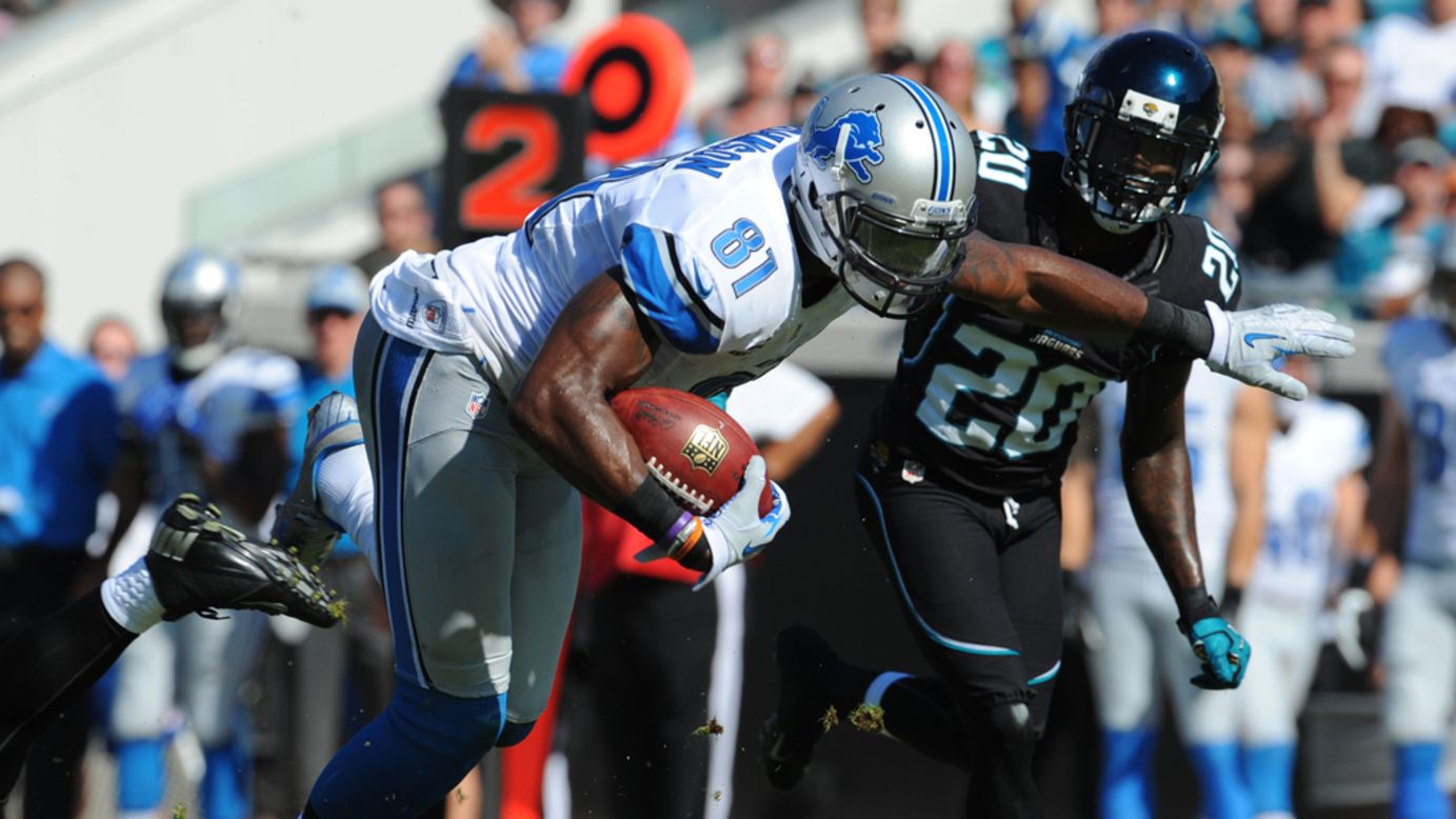 Wide receiver Calvin Johnson of the Detroit Lions grabs a midfield pass against the Jacksonville Jaguars on Sunday, November 4, at EverBank Field in Jacksonville, Florida. 