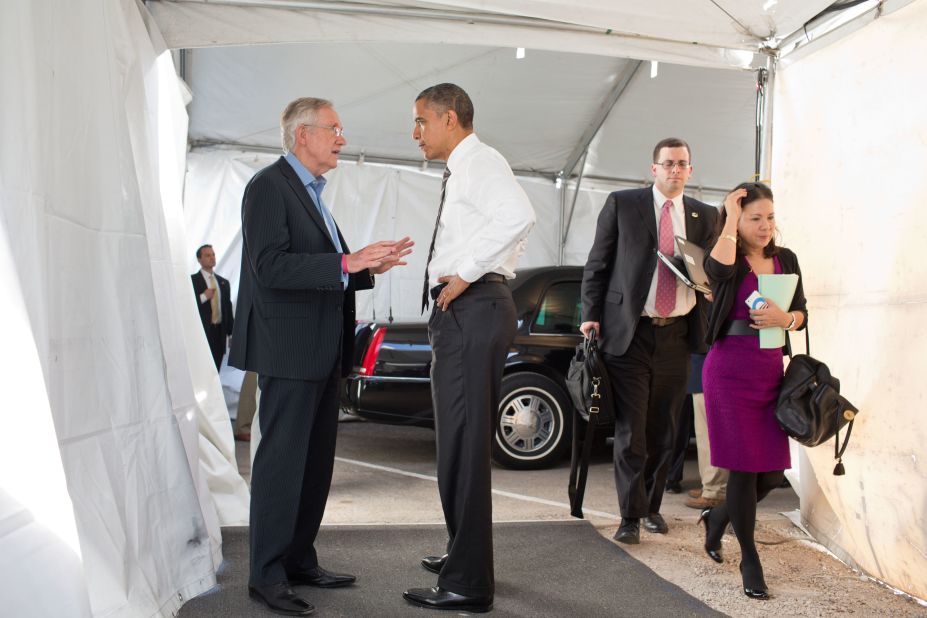 Obama greets Senate Majority Leader Harry Reid, D-Nevada, at the Cheyenne Sports Complex in Las Vegas on Nov. 1, 2012.