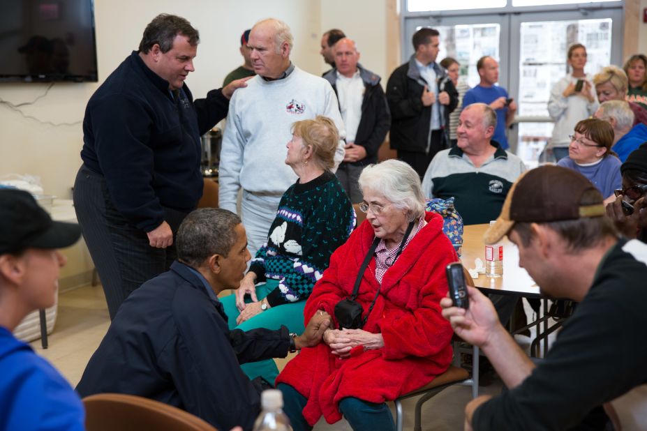 Obama and New Jersey Gov. Chris Christie talk with local residents at the Brigantine Beach Community Center in Brigantine, New Jersey, on Oct. 31, 2012.