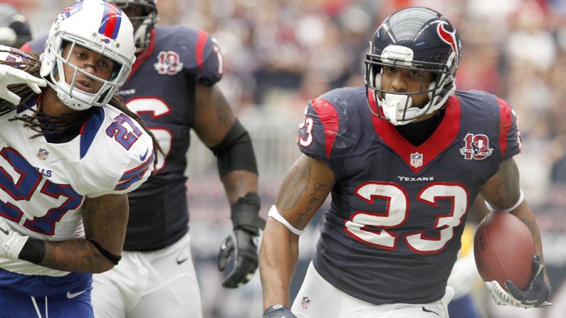 Houston Texans running back Arian Foster looks for daylight against the Buffalo Bills on Sunday at Reliant Stadium in Houston. The Texans won 21-9.