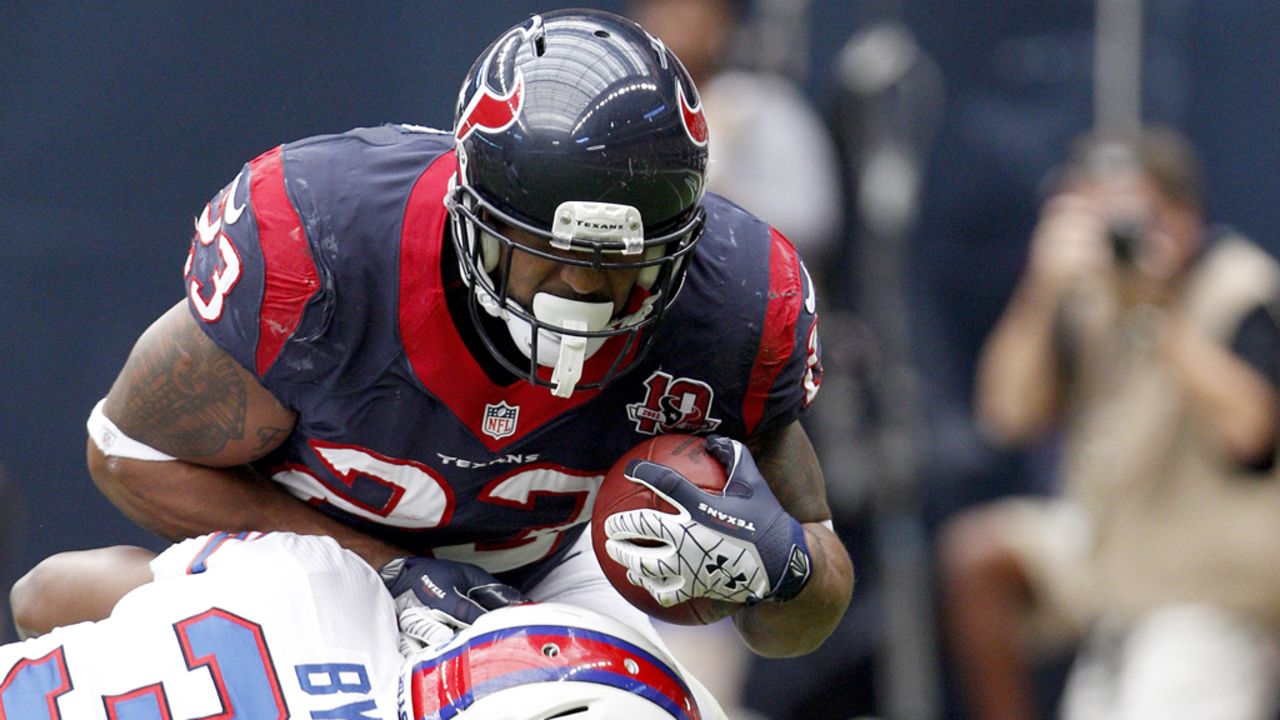 Texans running back Arian Foster is tackled by Bills safety Jairus Byrd.