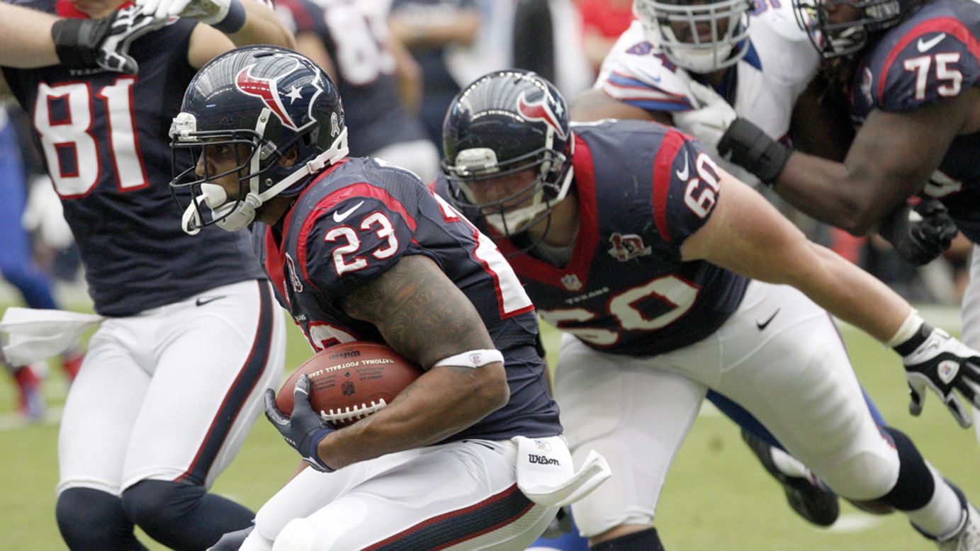 Texans running back Arian Foster rushes against the Bills on Sunday.