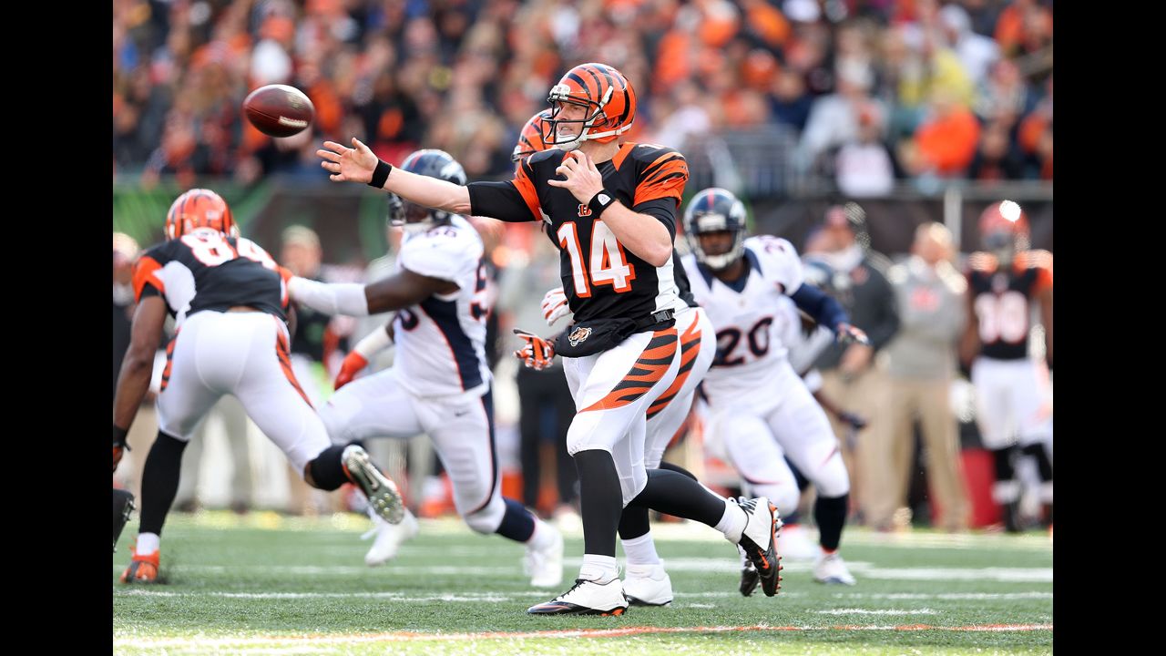 Andy Dalton of the Bengals throws a pass during the game against the Broncos.