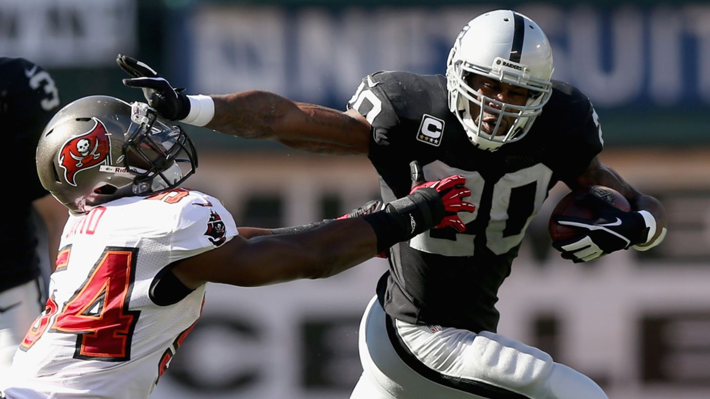 Oakland Raiders running back Darren McFadden gets away from Lavonte David of the Tampa Bay Buccaneers on Sunday at O.co Coliseum  in Oakland, California.