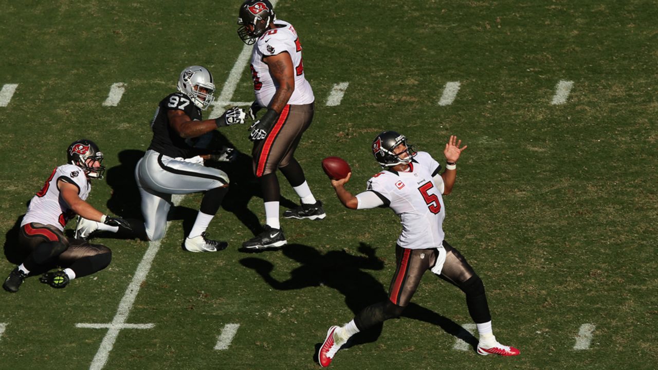 Buccaneers quarterback Josh Freeman looks for an open receiver.