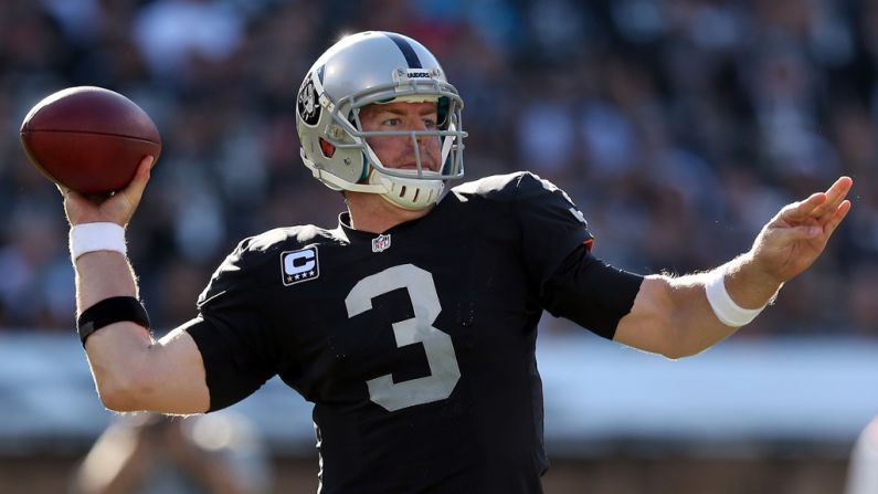 Raiders quarterback Carson Palmer of the Raiders passes the ball.
