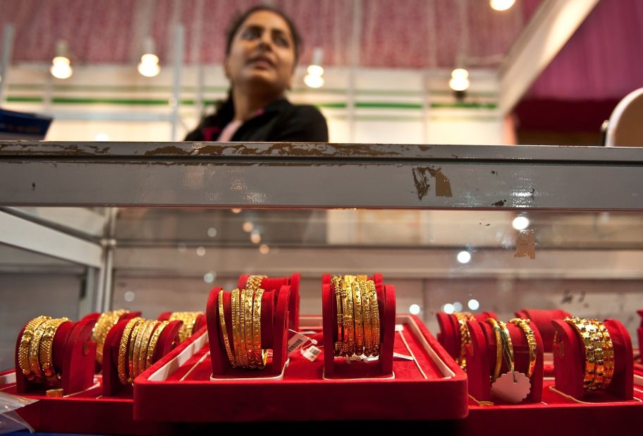 Indian women buy gold jewelry on Dhanteras -- the first day of the five-day festival -- in the belief it will bring them good fortune.