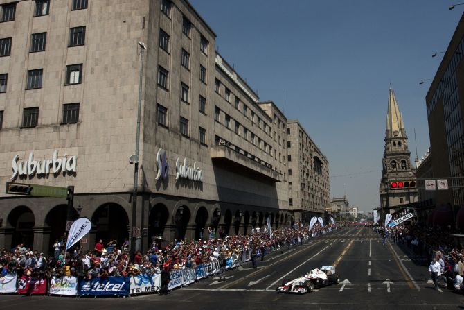 Seen here driving in an exhibition through the streets of his home city Guadalajara, Perez was already winning kart races by the age of six.