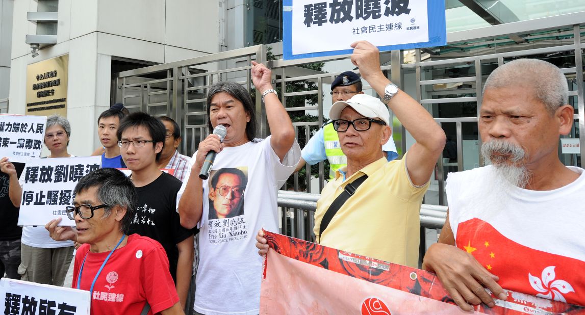 Hong Kong legislator Leung Kwok-hung (C), also known as "Long Hair," recently demanded for the release of Chinese dissident Liu Xiaobo during a protest outside the Chinese liaison office in Hong Kong -- emphasizing the commitment to free speech in the city.