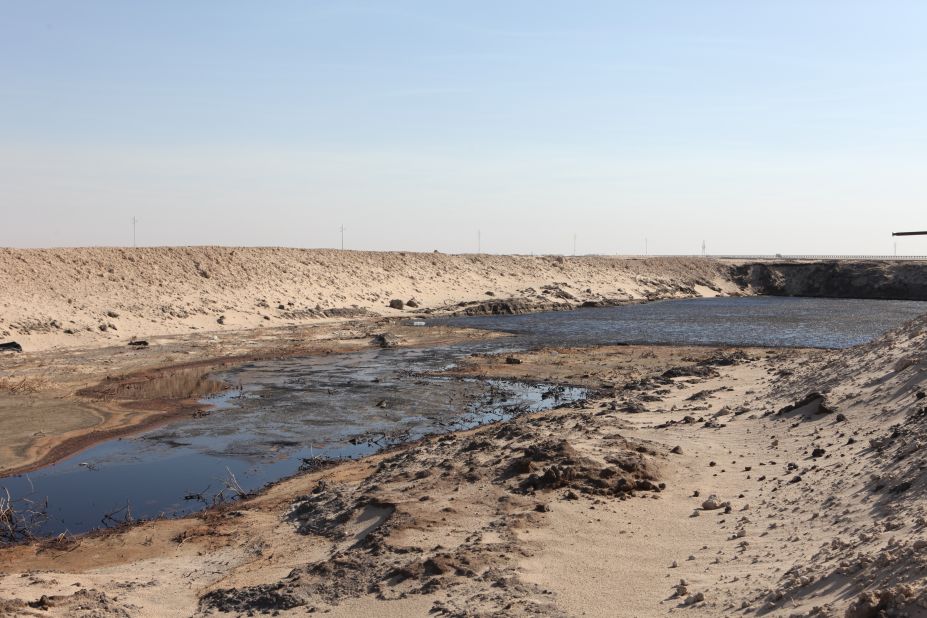 One of the oil lakes, caused by crude oil mixing with the billions of gallons of seawater used to extinguish the oilfield fires, contaminating about 100 square kilometers of Kuwait's desert.