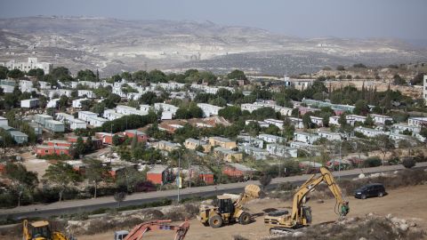 Bulldozers begin constructing a new neighborhood in the Ariel settlement in the West Bank on September 27, 2010.