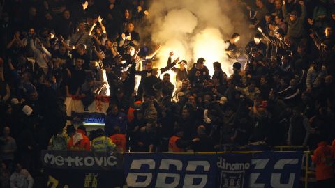 Dinamo Zagreb fans light flares during a match against Tottenham Hotspur at White Hart Lane in London on November 6, 2008.