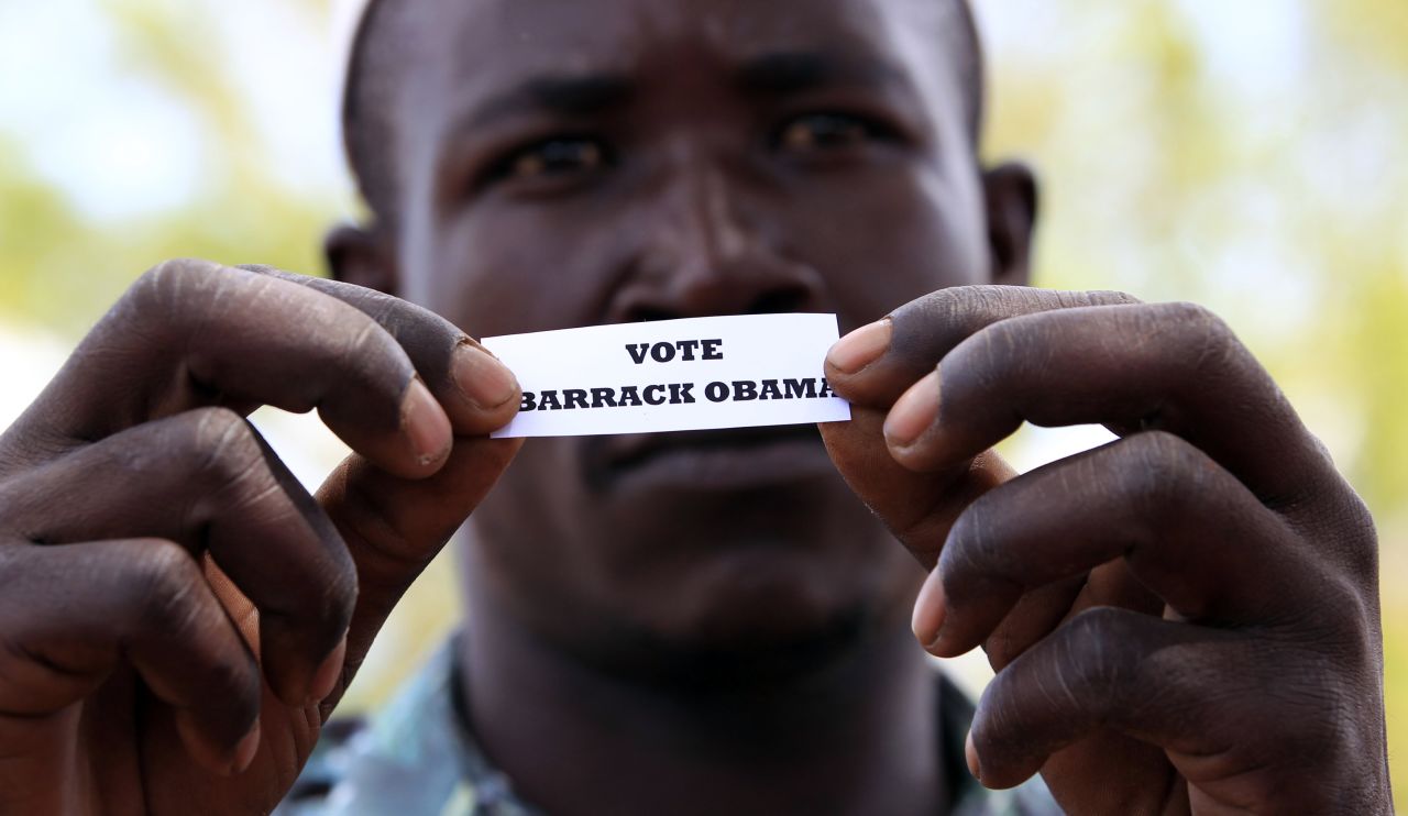 A man displays his ballot during a mock vote in Kogelo, Kenya.