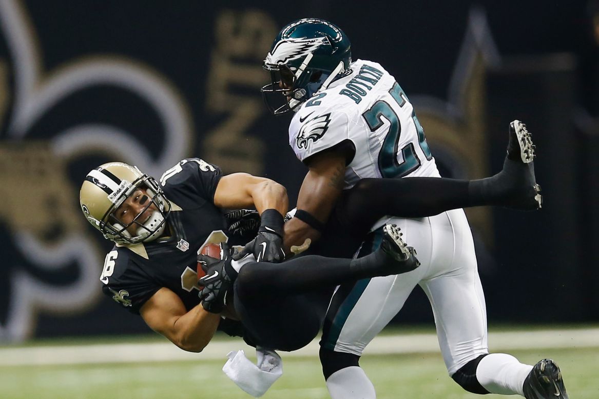 Lance Moore of the New Orleans Saints catches a pass over Dominique Rodgers-Cromartie of the Philadelphia Eagles.