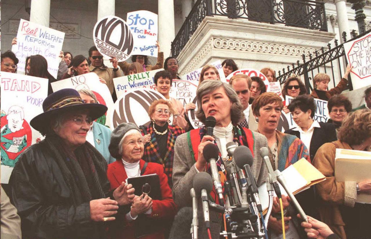 U.S. Rep. Patricia Schroeder speaks at a vigil to protest welfare reform on Capitol Hill in 1995 as former Rep. Bella Abzug, left, looks on.