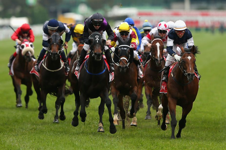 Brett Prebble riding Green Moon crosses the finish line to win the 2012 Melbourne Cup. The six-year-old Bay Stallion is owned by Australian businessman Lloyd Williams who now has four Cup wins. Green Moon defeated the Gai Waterhouse-trained Fiorente, with Jakkalberry third.
