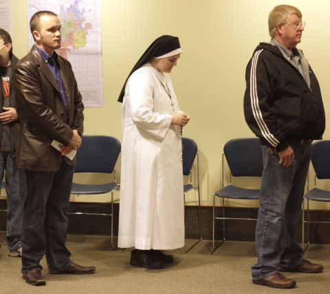 A nun waited in line to cast her vote in Janesville, Wisconsin.