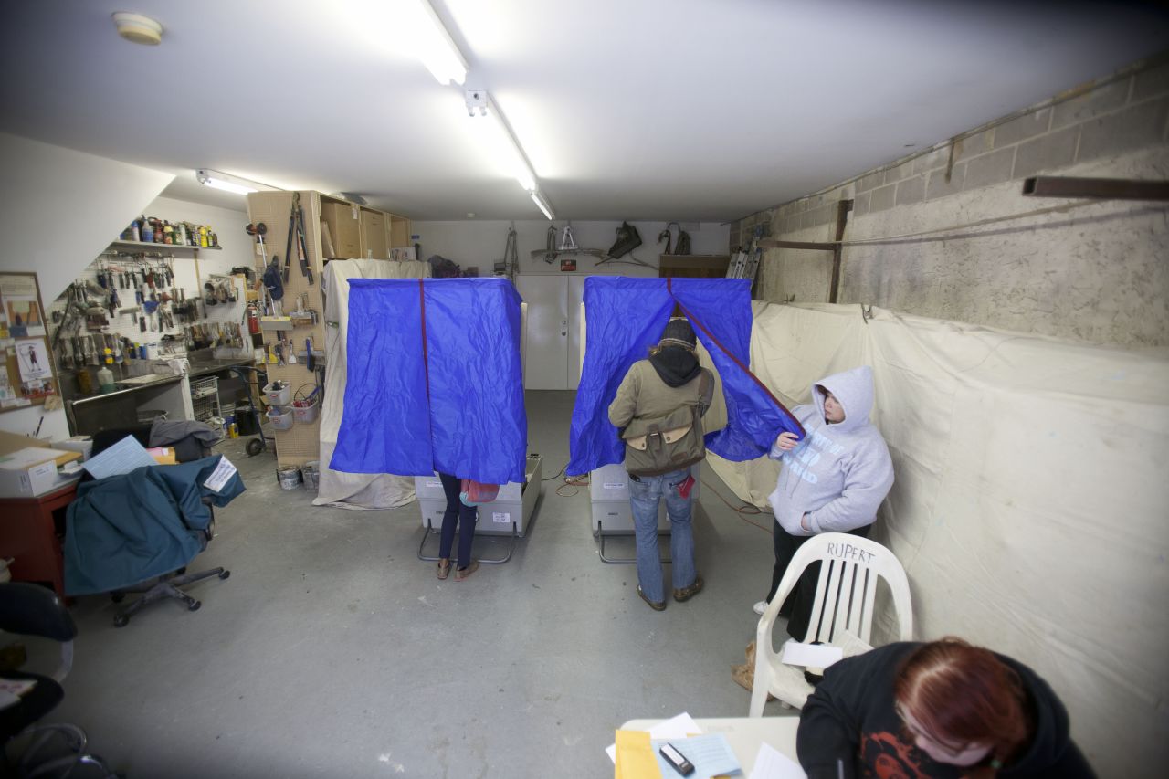 People cast their ballots inside a decorator's garage in South Philadelphia on Tuesday.