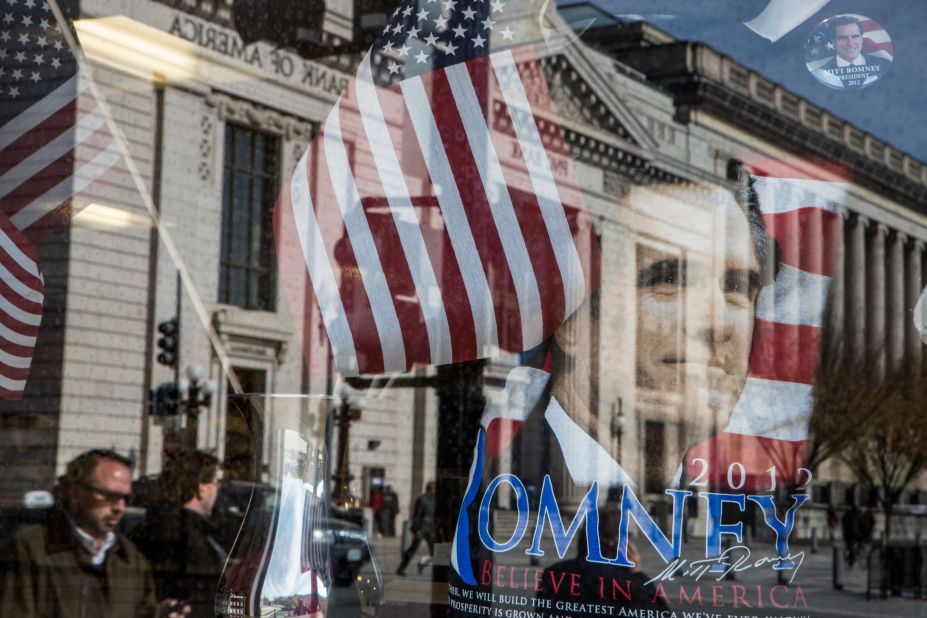 A street scene was reflected in the window of a gift shop near the White House in Washington, DC. 