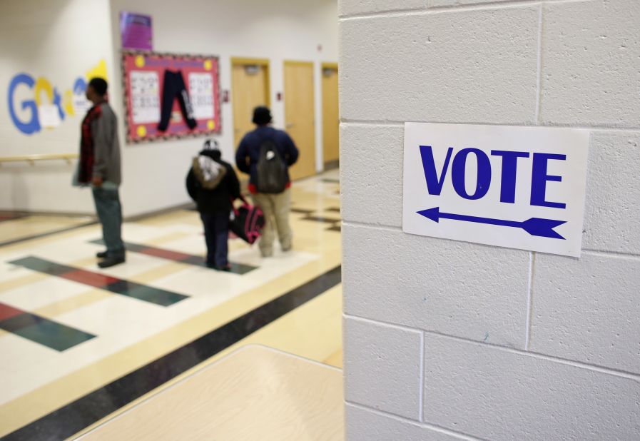 A sign directed voters to the gymnasium at Dr. Martin Luther King, Jr. School in Milwaukee, Wisconsin.