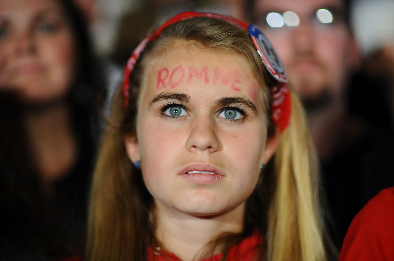 A Romney fan shows her support at Monday's rally in Columbus.