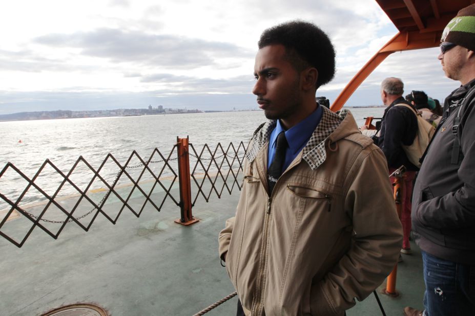Abraham Cambrelen, 19, takes the Staten Island Ferry to go check on his mother Sunday while New York recovers from Hurricane Sandy.