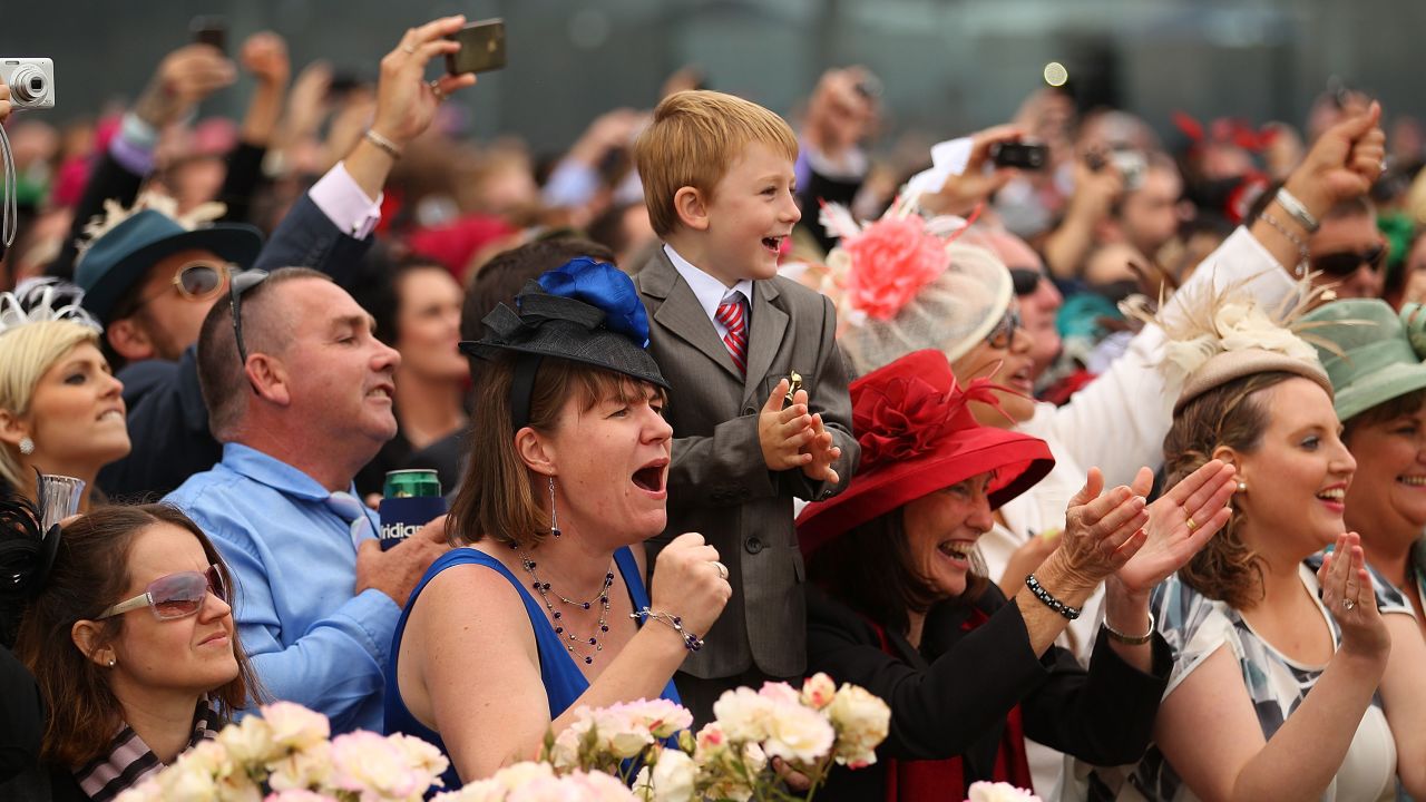 Racegoers watch Race 7 the Emirates Melbourne Cup during Melbourne Cup Day at Flemington Racecourse on November 1, 2011 in Melbourne
