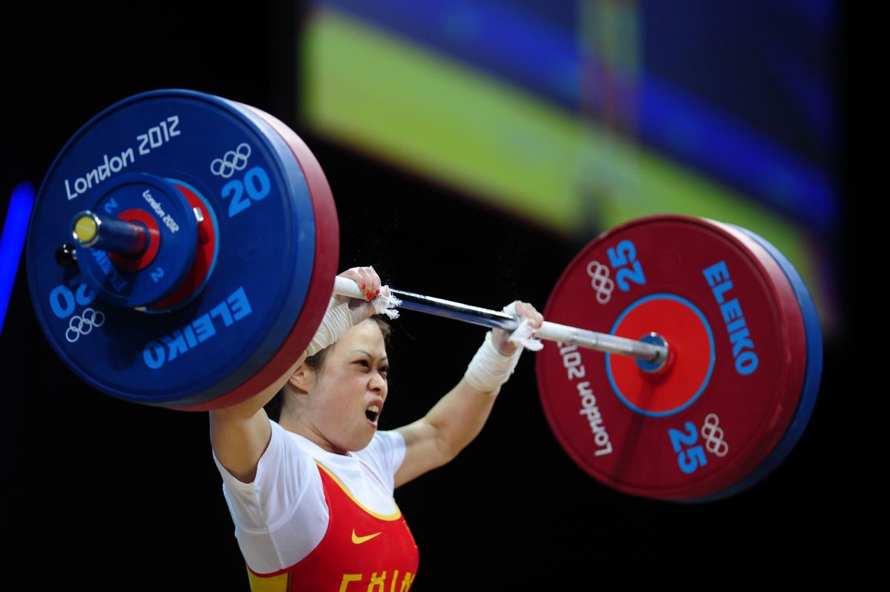 China's Wang Mingjuan weighs only 106 pounds, but she can lift more than 200. Wang claimed the weightlifting gold medal of the 2012 Olympic Games in the women's lightest category. The 26-year-old four-time world champion has not been defeated in international competition since winning her first world title in 2002, <a href="http://www.dailymail.co.uk/sport/olympics/article-2180318/London-2012-Olympics-Wang-Mingjuan-wins-weightlifting-gold.html#ixzz2BMmxKGCx" target="_blank" target="_blank">according to the Daily Mail</a>.