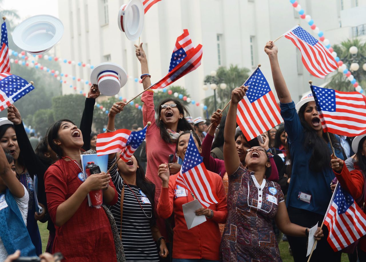 University students in Delhi, India, celebrate Wednesday after hearing about Obama's re-election during a U.S. Embassy party.