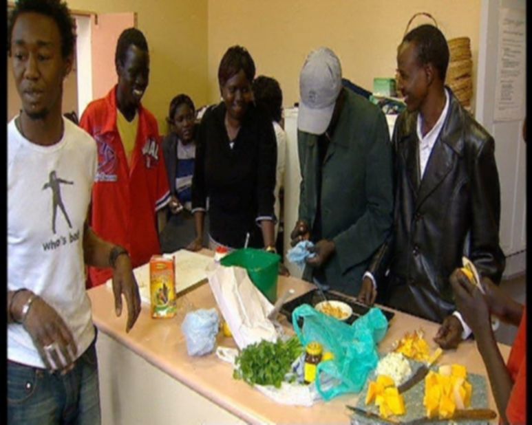 Kuol held cookery classes in a church hall in Adelaide for young Sudanese refugees.
