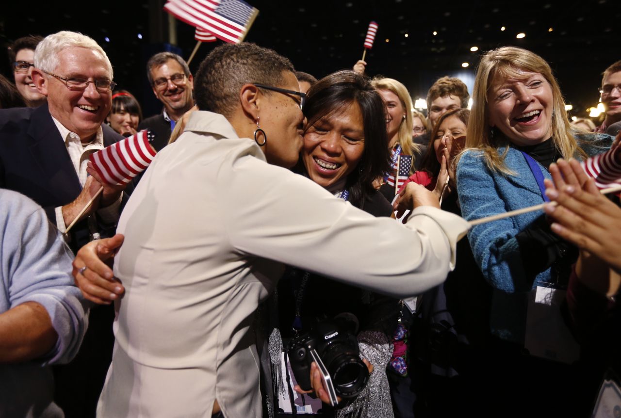 Keesha Patterson, left, proposed to Rowan Ha during a rally at Obama headquarters in Chicago. The women live in Maryland, where voters approved same-sex marriage.