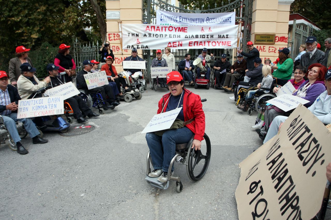 Wheelchair users protest against a new government austerity bill in Thessaloniki on 7 November, 2012.