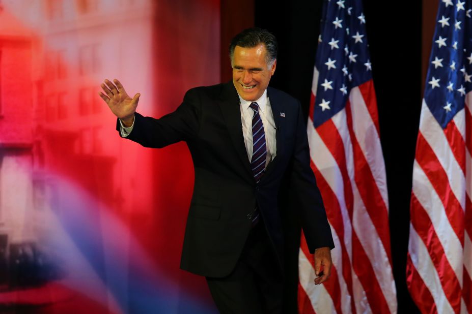 Mitt Romney waved to a crowd of supporters before conceding the presidency.