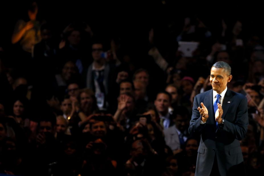 President Barack Obama clapped onstage in Chicago as the crowd cheered his reelection. 