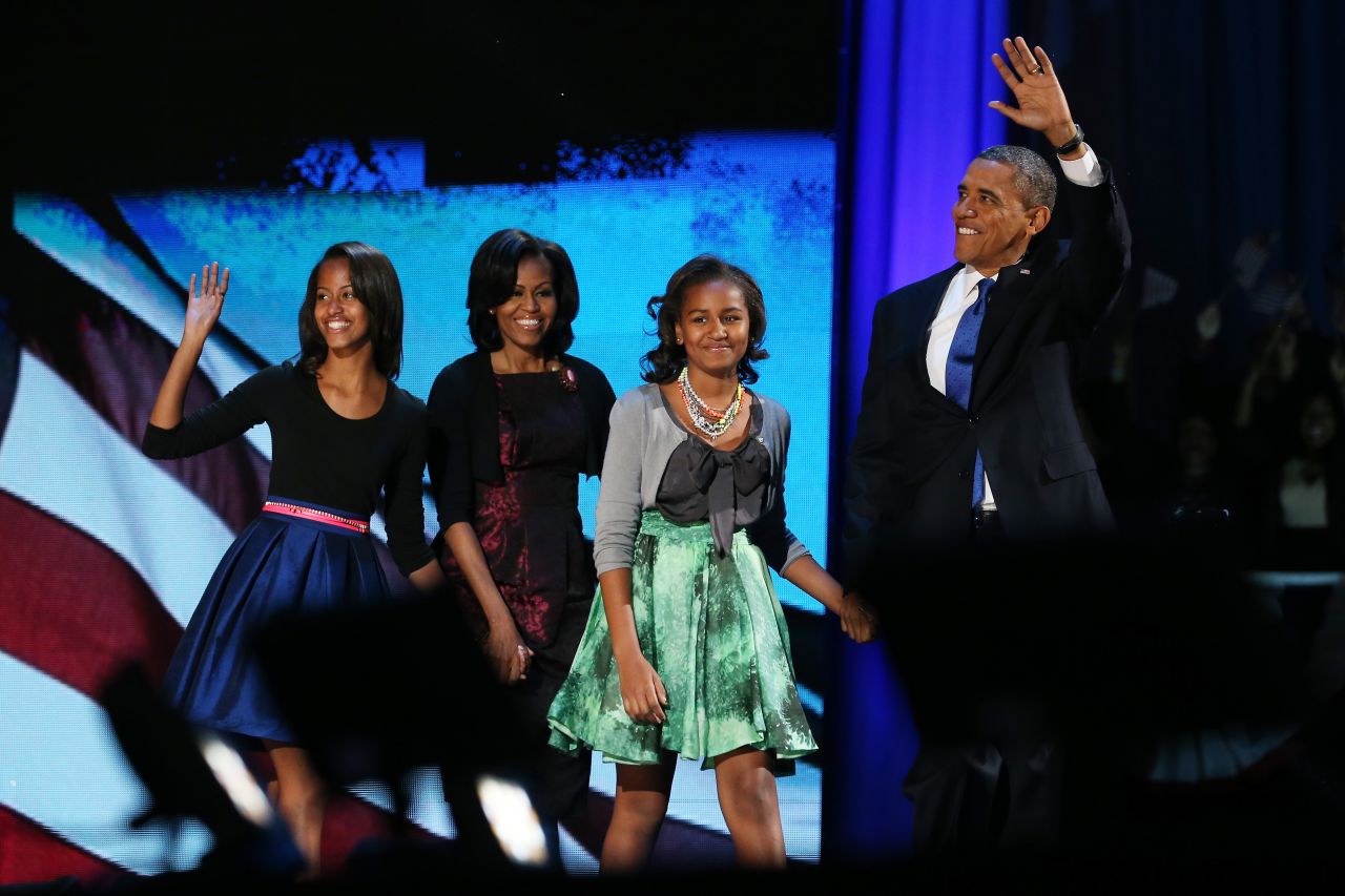  President Barack Obama walked onstage with first lady Michelle Obama and daughters Sasha and Malia to deliver his victory speech.